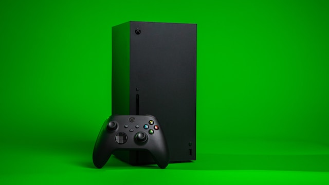 Xbox Series X on a green background